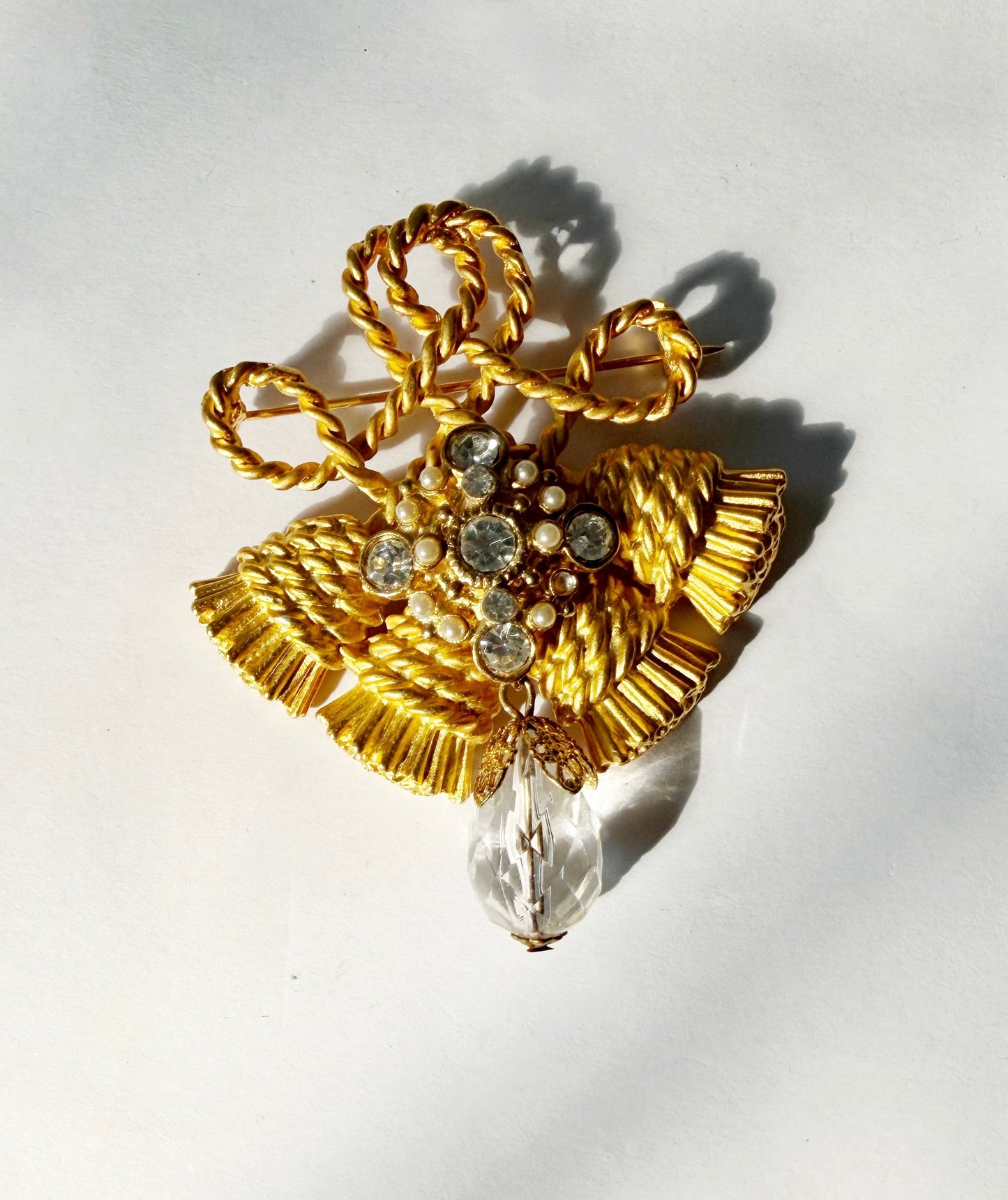 Rhinestone gold fringe brooch