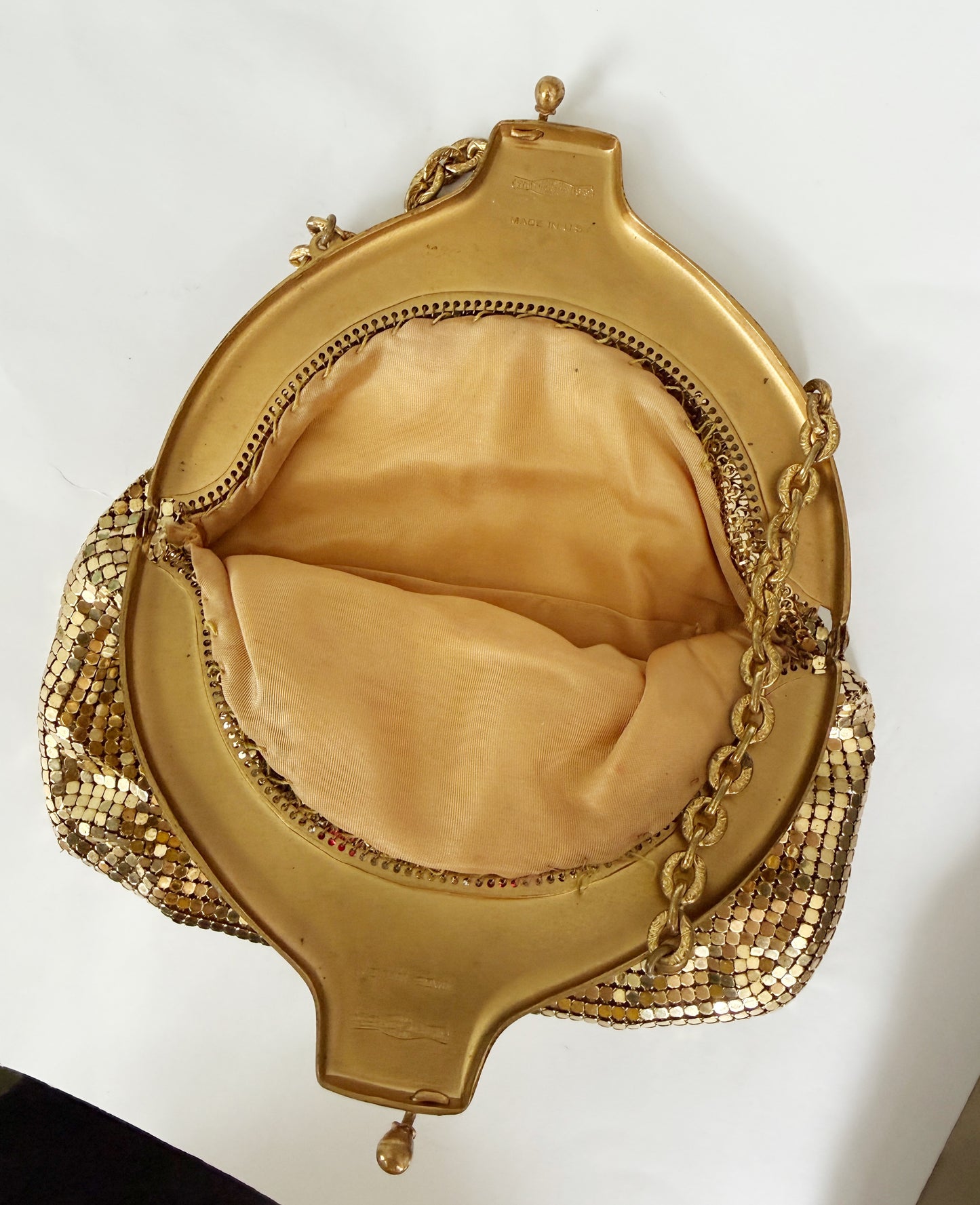 Ode to the master CRYBABY gold mesh purse