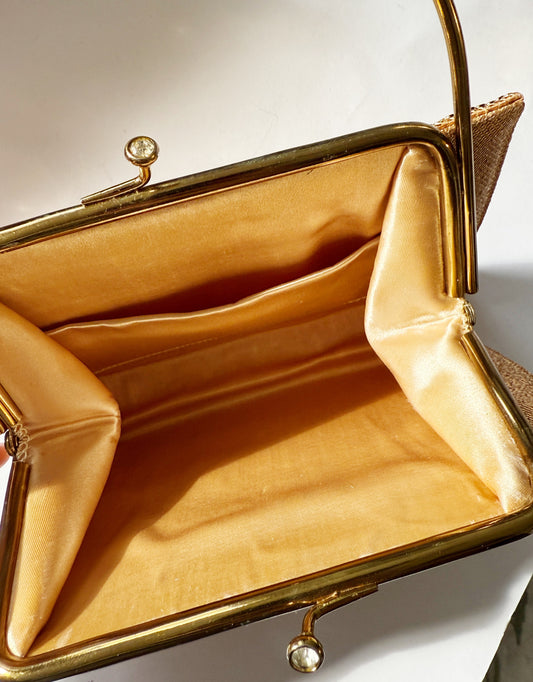 Ode to the master CRYBABY gold mesh purse