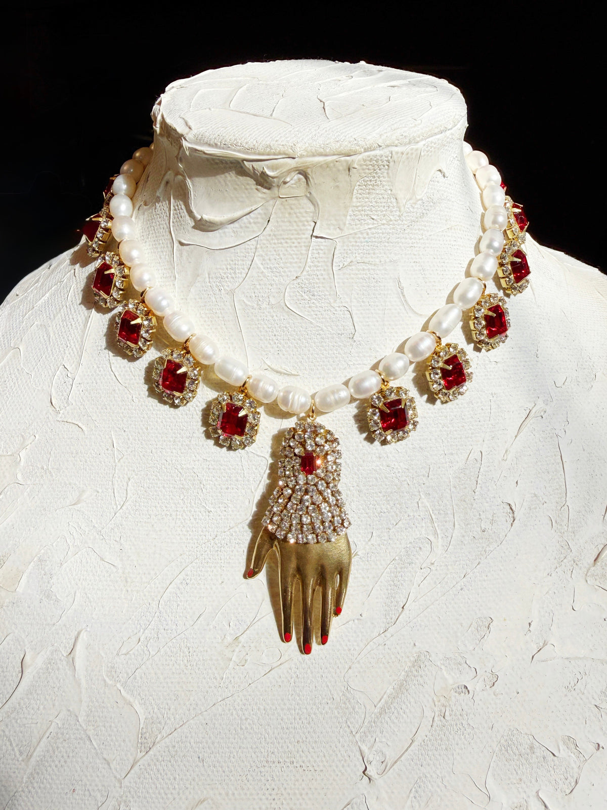 Regal rhinestone hand pearl necklace