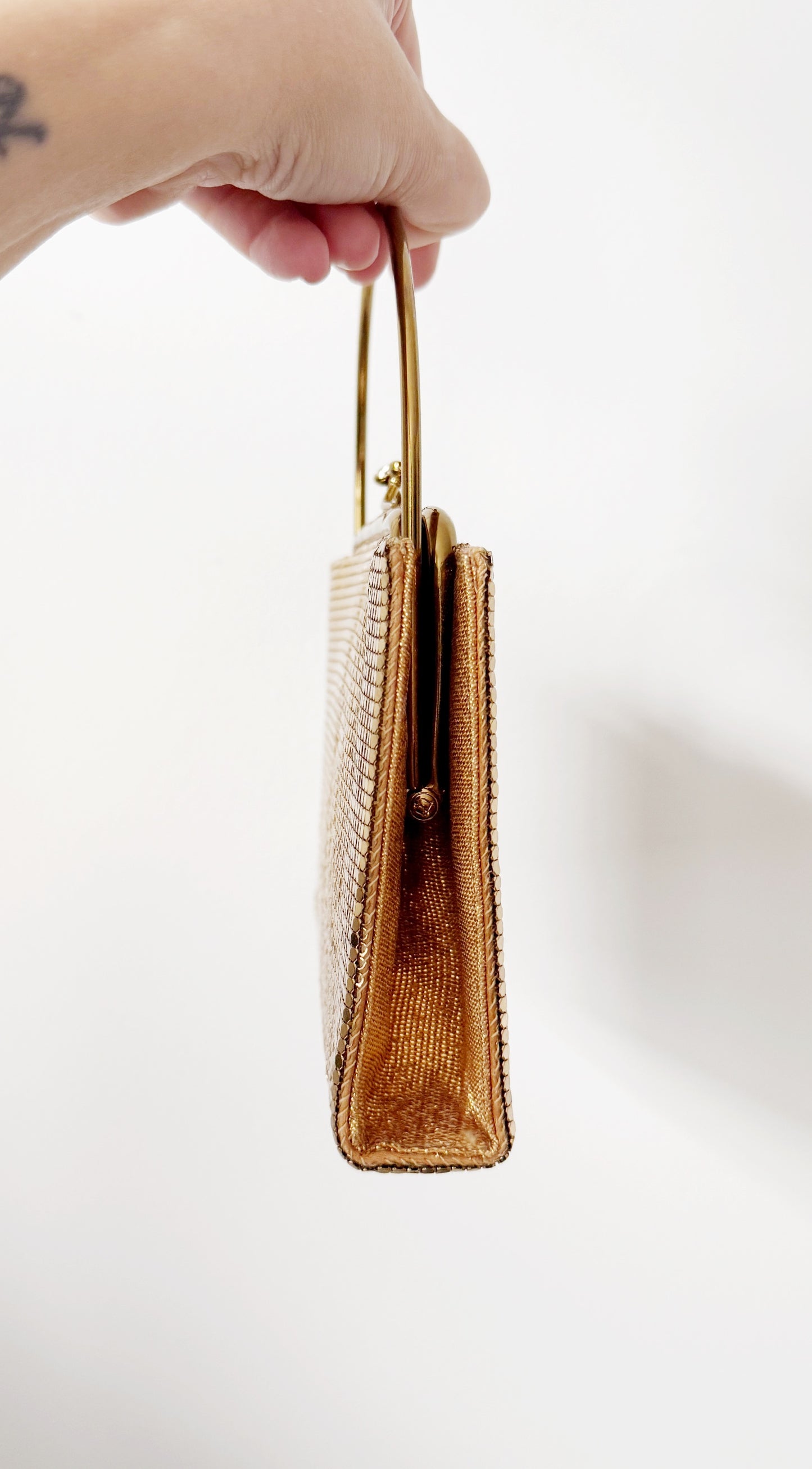 Ode to the master CRYBABY gold mesh purse