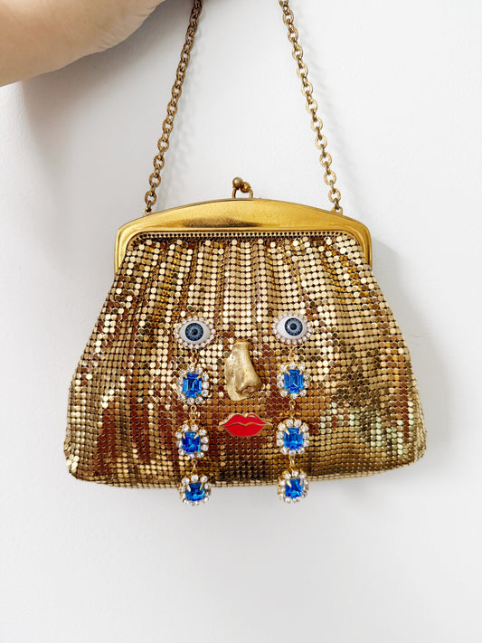 Ode to the master CRYBABY gold mesh purse