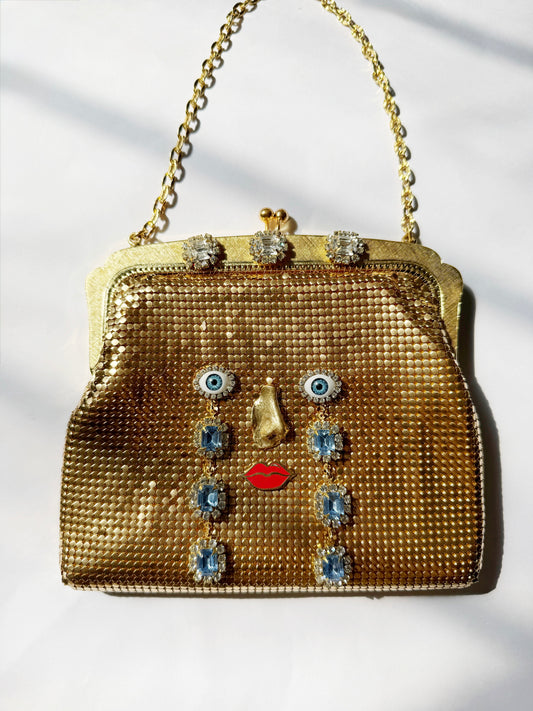Ode to the master CRYBABY gold mesh purse