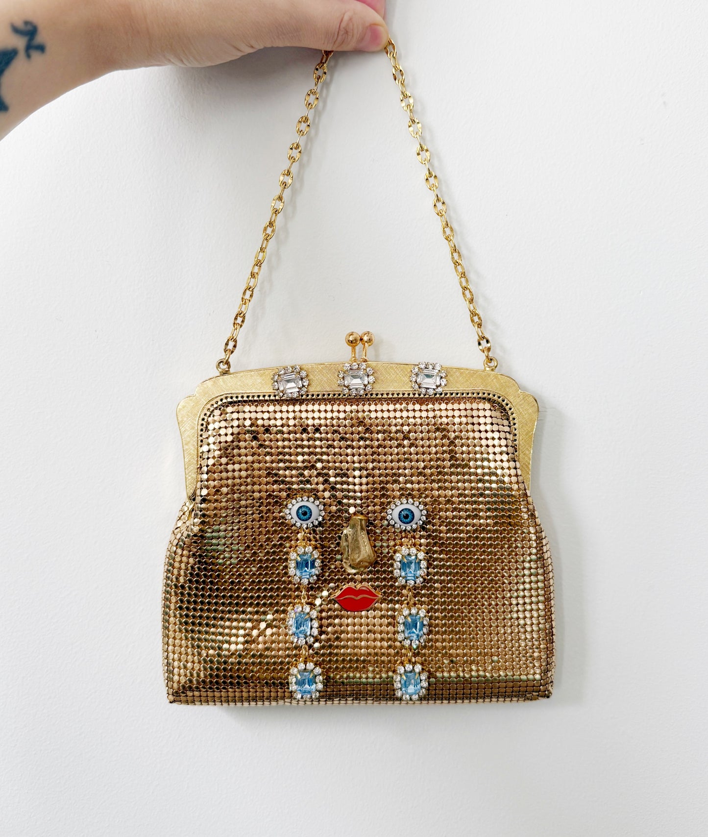 Ode to the master CRYBABY gold mesh purse
