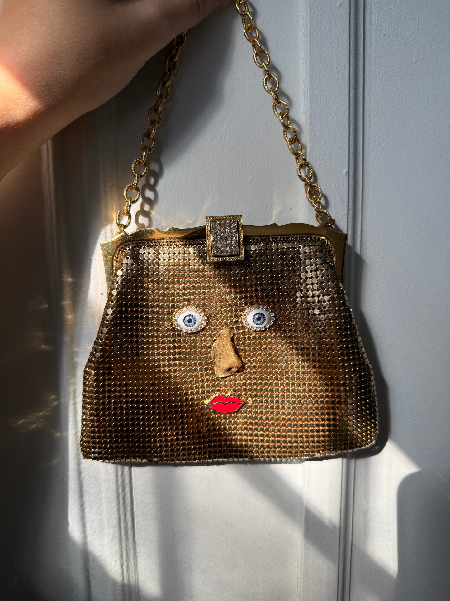 Ode to the masters gold mesh purse