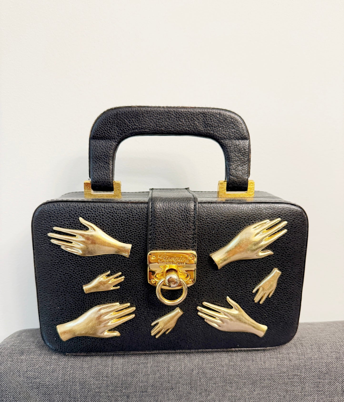 All Hands in black leather purse