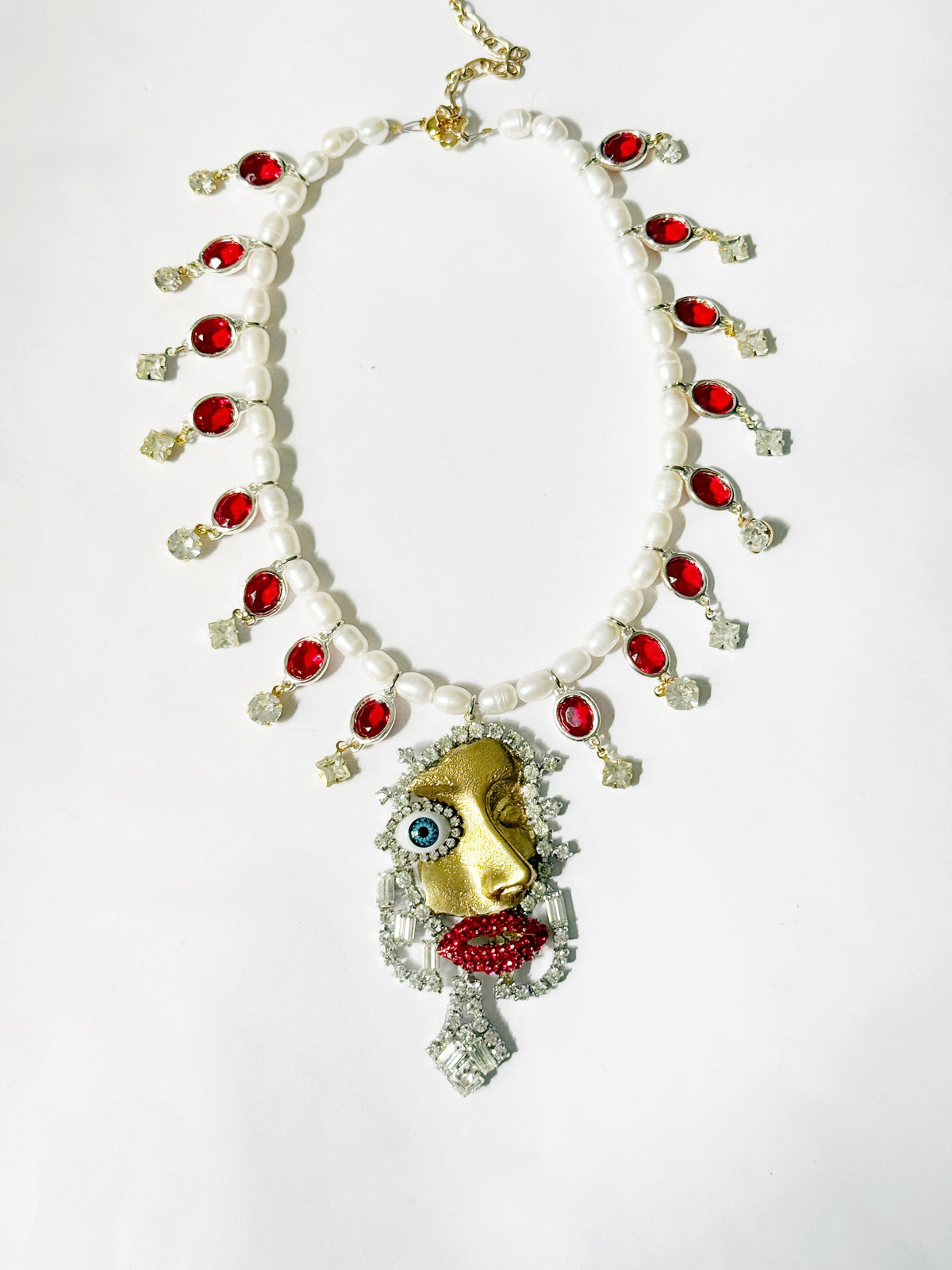 IF Dali, Picasso, Schiaparelli & Mad Max Fury Road had a baby necklace