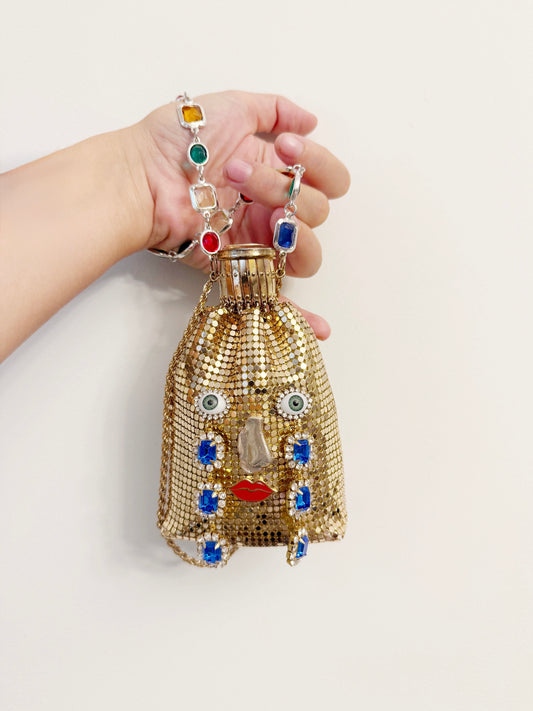 Ode to the master crybaby accordion purse