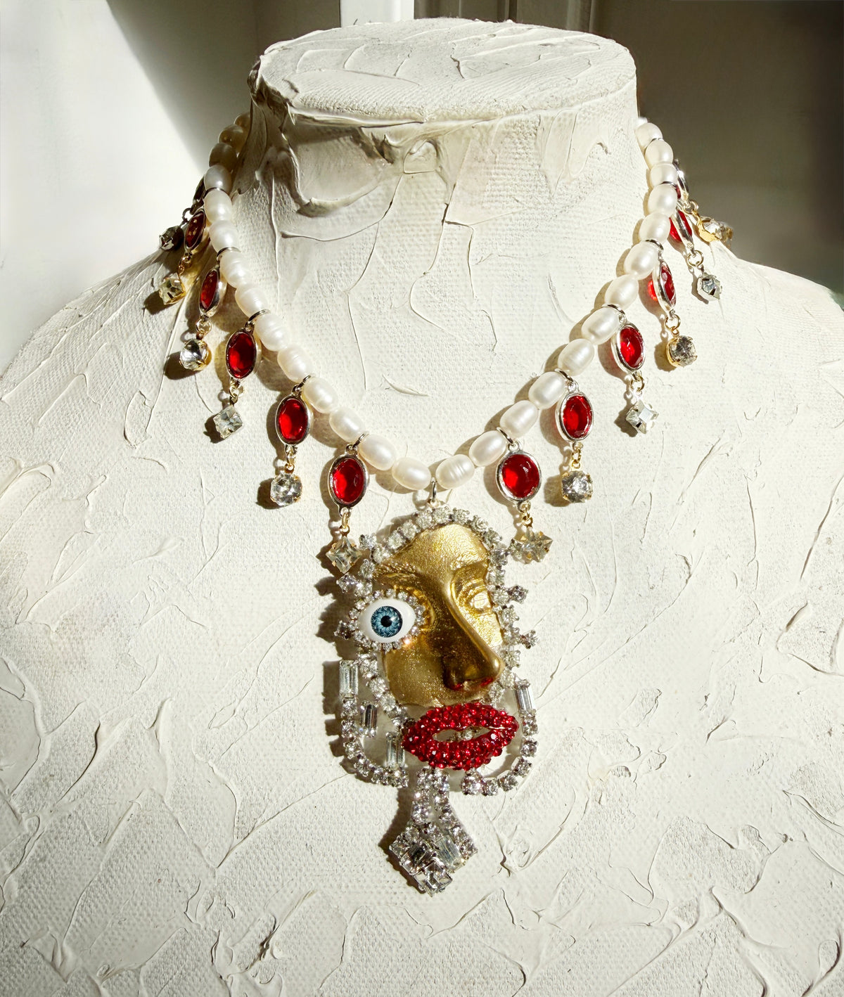 IF Dali, Picasso, Schiaparelli & Mad Max Fury Road had a baby necklace