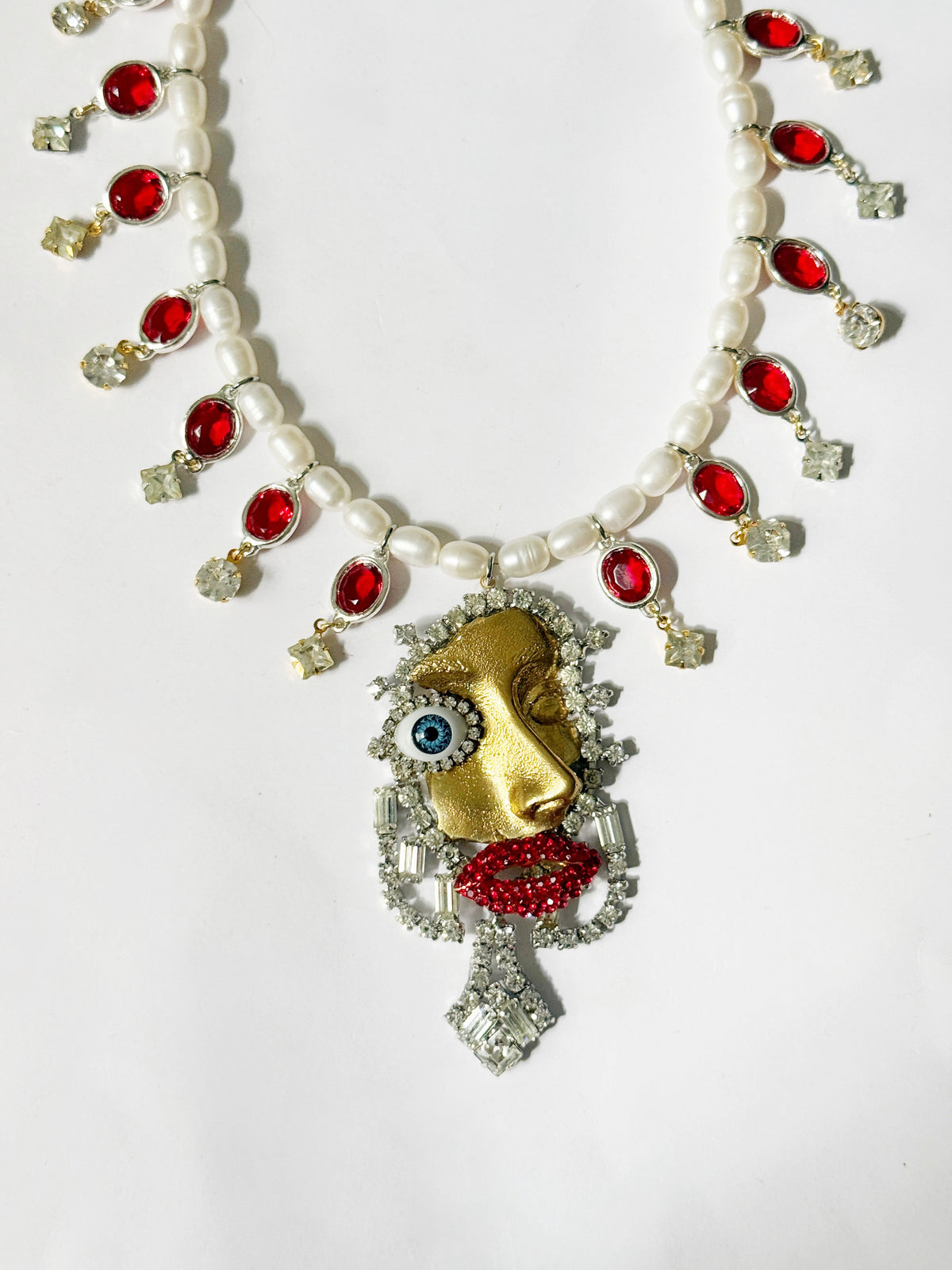 IF Dali, Picasso, Schiaparelli & Mad Max Fury Road had a baby necklace