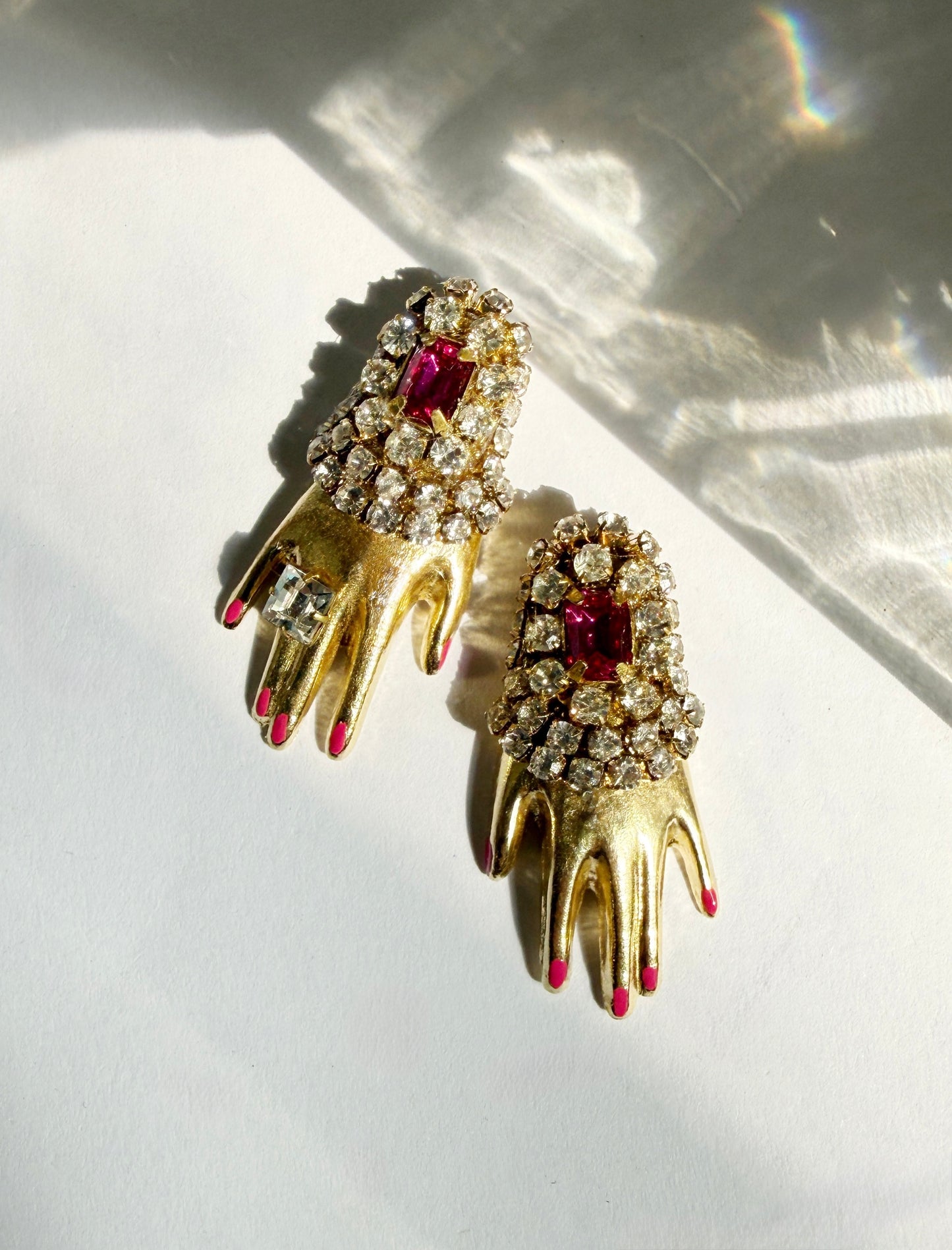 Regal rhinestone hand earrings