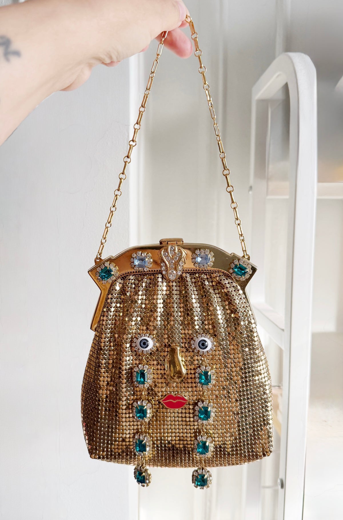 Ode to the master CRYBABY gold mesh purse