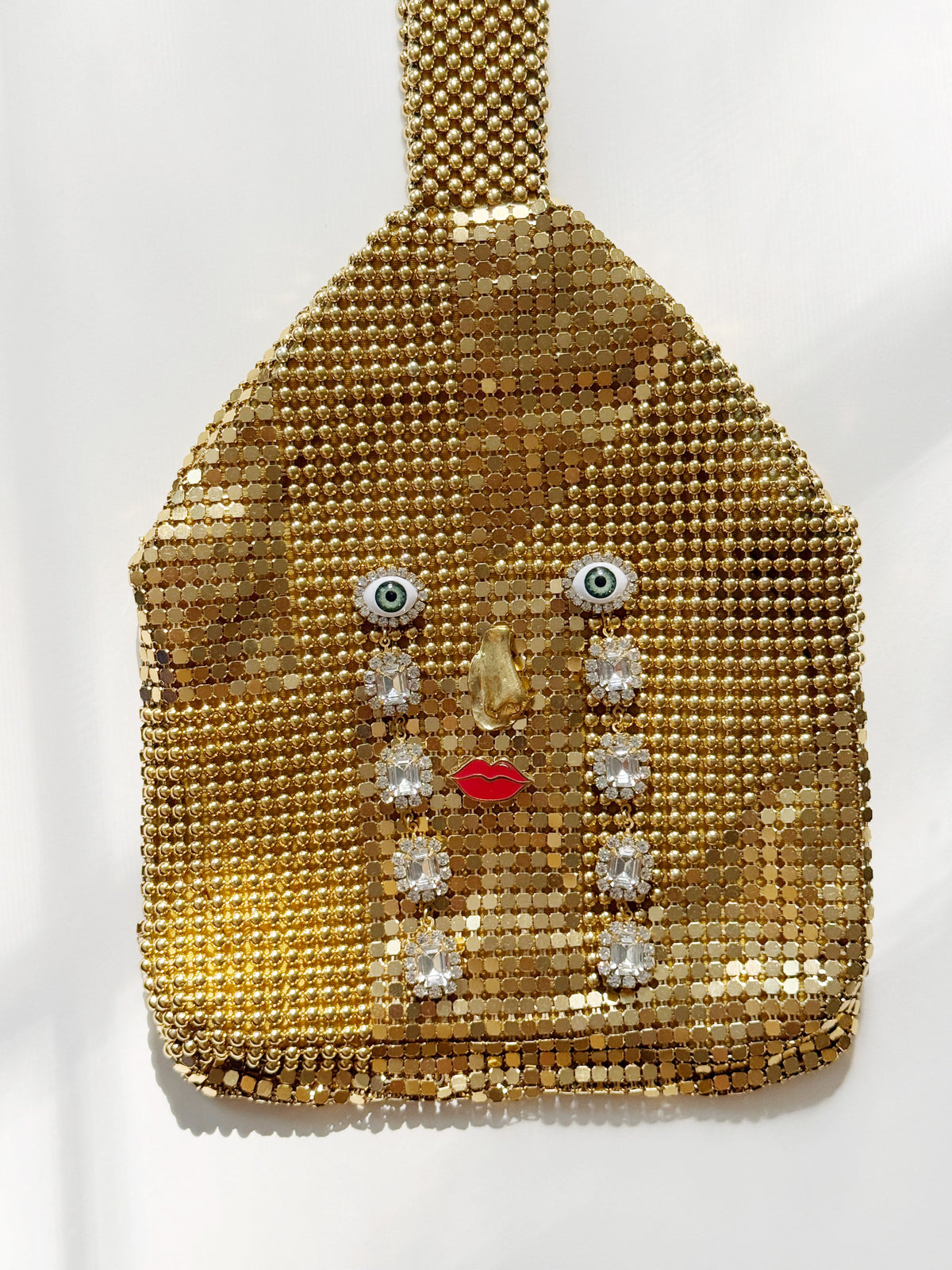 Ode to the master CRYBABY gold mesh purse
