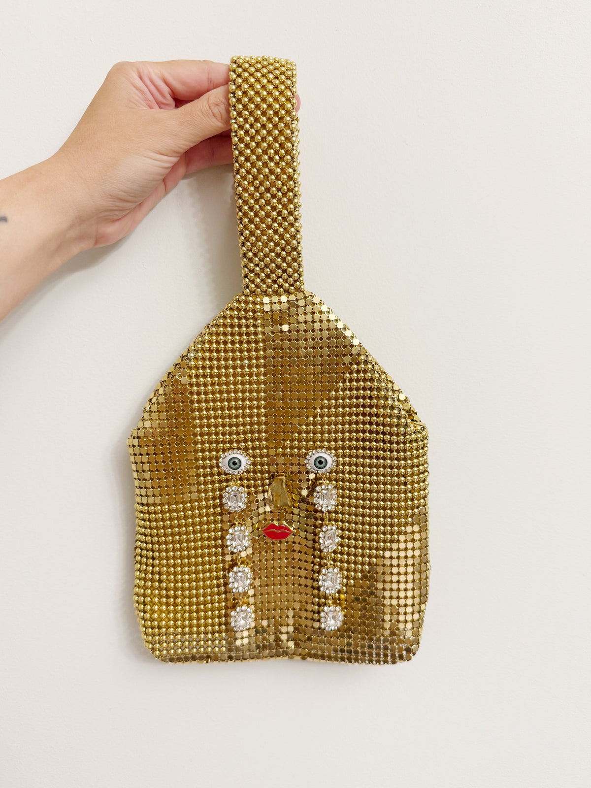 Ode to the master CRYBABY gold mesh purse