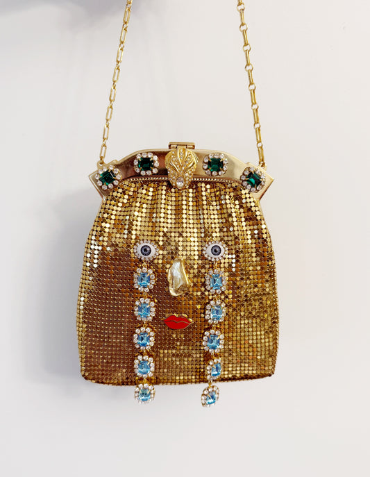 Ode to the master CRYBABY gold mesh purse