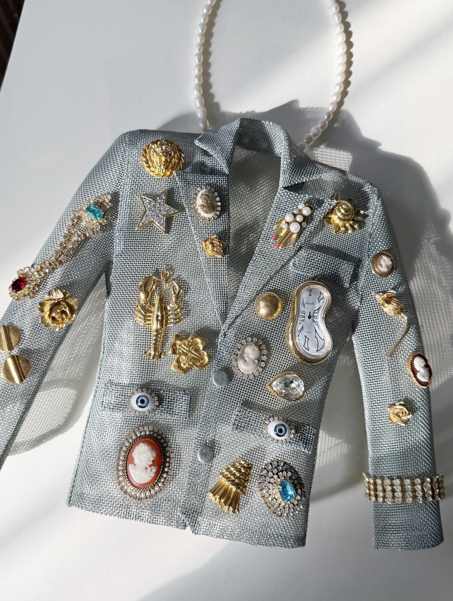 Surrealist dream blazer necklace
