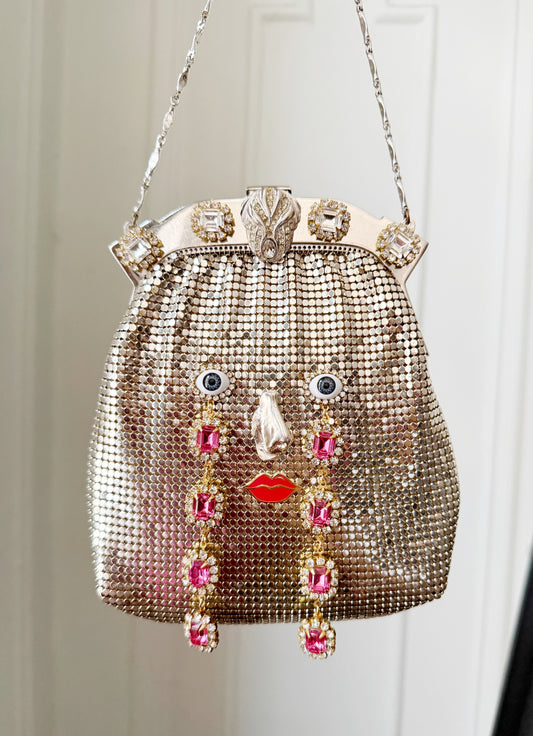 Ode to the master CRYBABY silver mesh purse