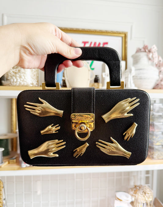 All Hands in black leather purse