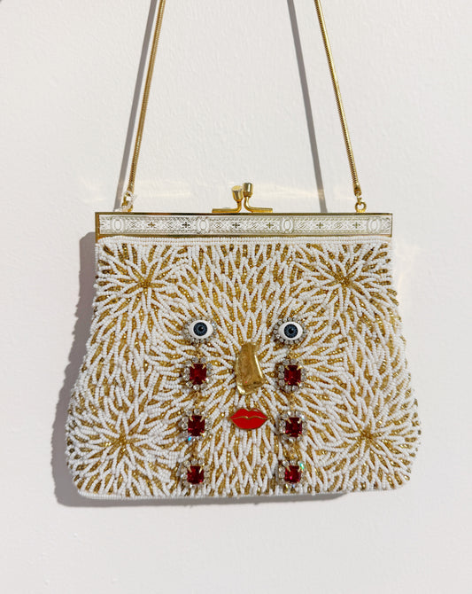 Ode to the master CRYBABY gold beaded purse