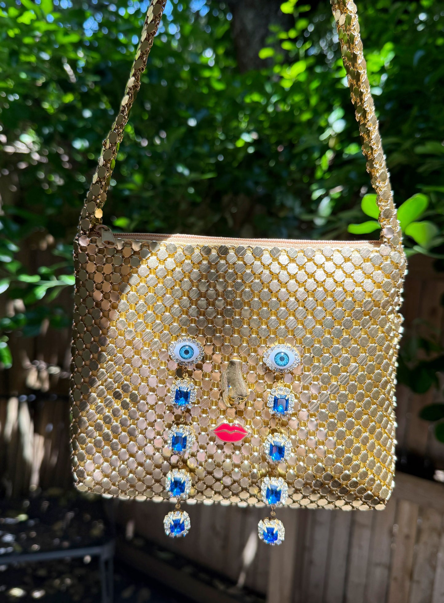 Ode to the master CRYBABY gold mesh purse