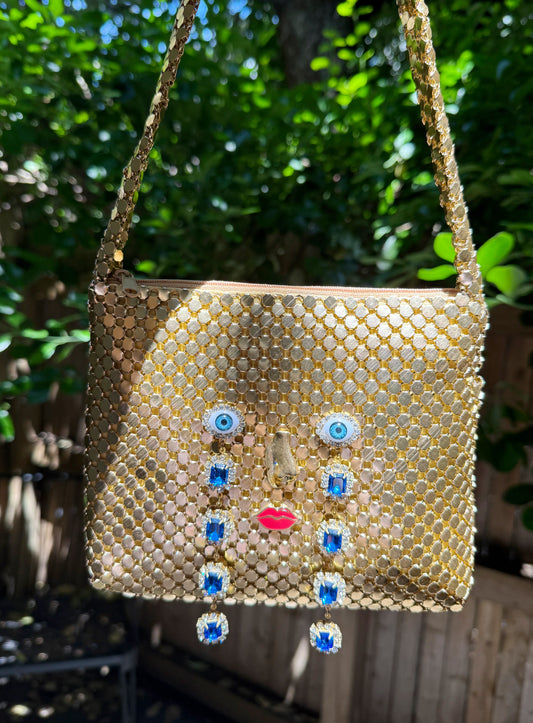 Ode to the master CRYBABY gold mesh purse