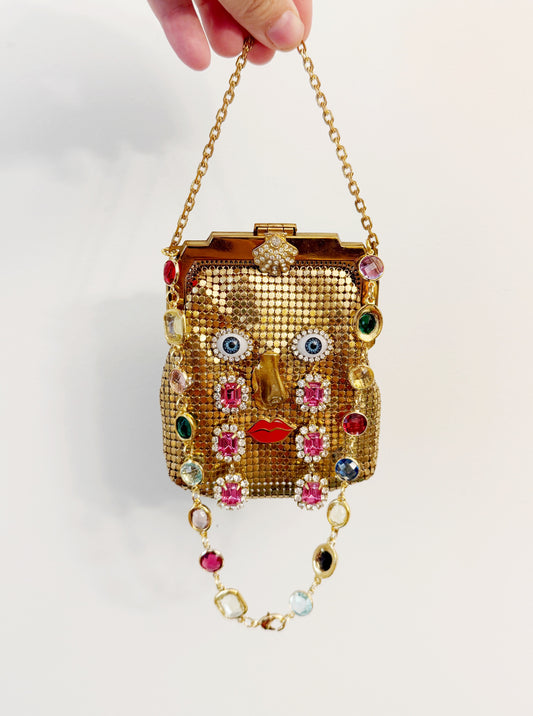 Ode to the master CRYBABY mesh purse necklace