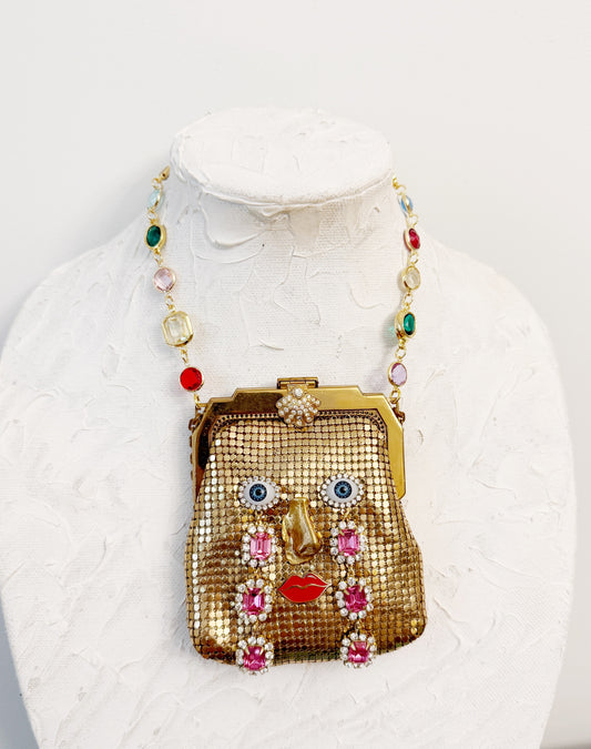 Ode to the master CRYBABY mesh purse necklace