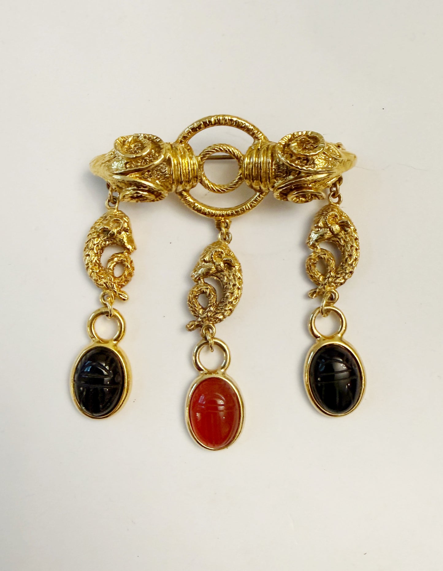 Double ram and scarab brooch