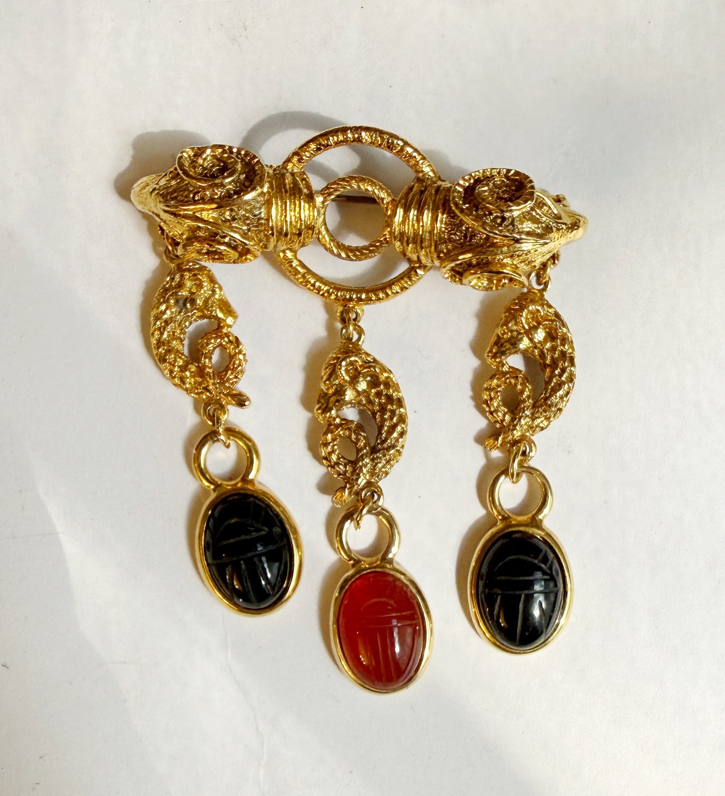 Double ram and scarab brooch