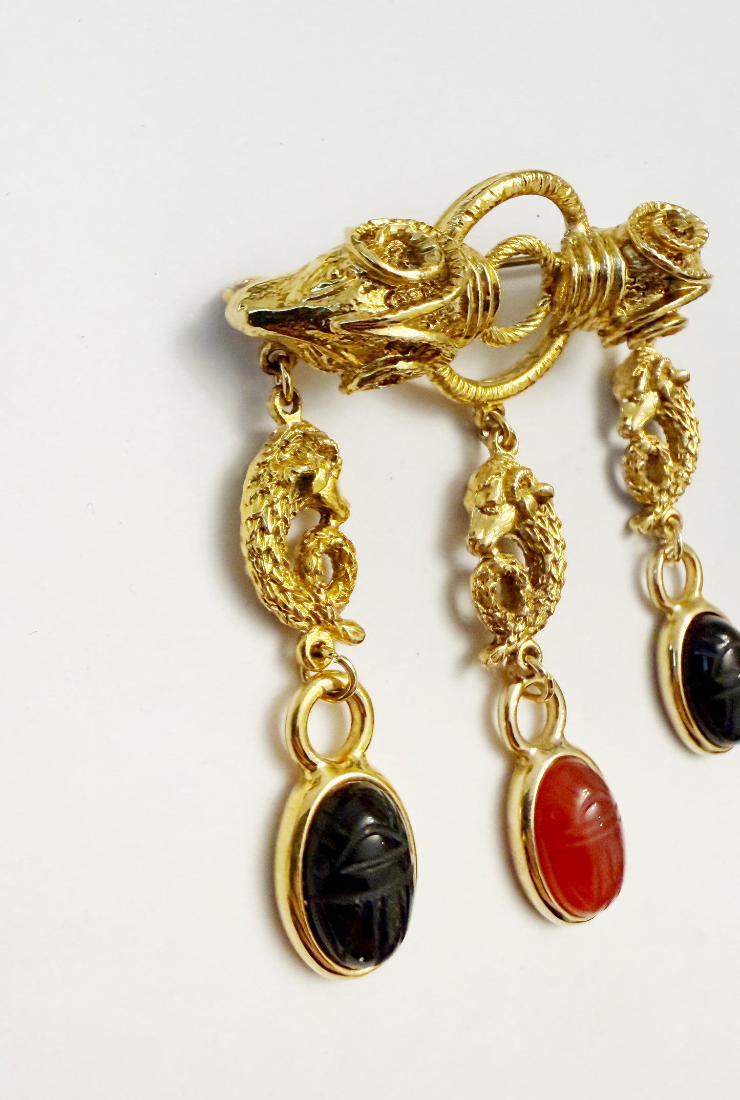 Double ram and scarab brooch